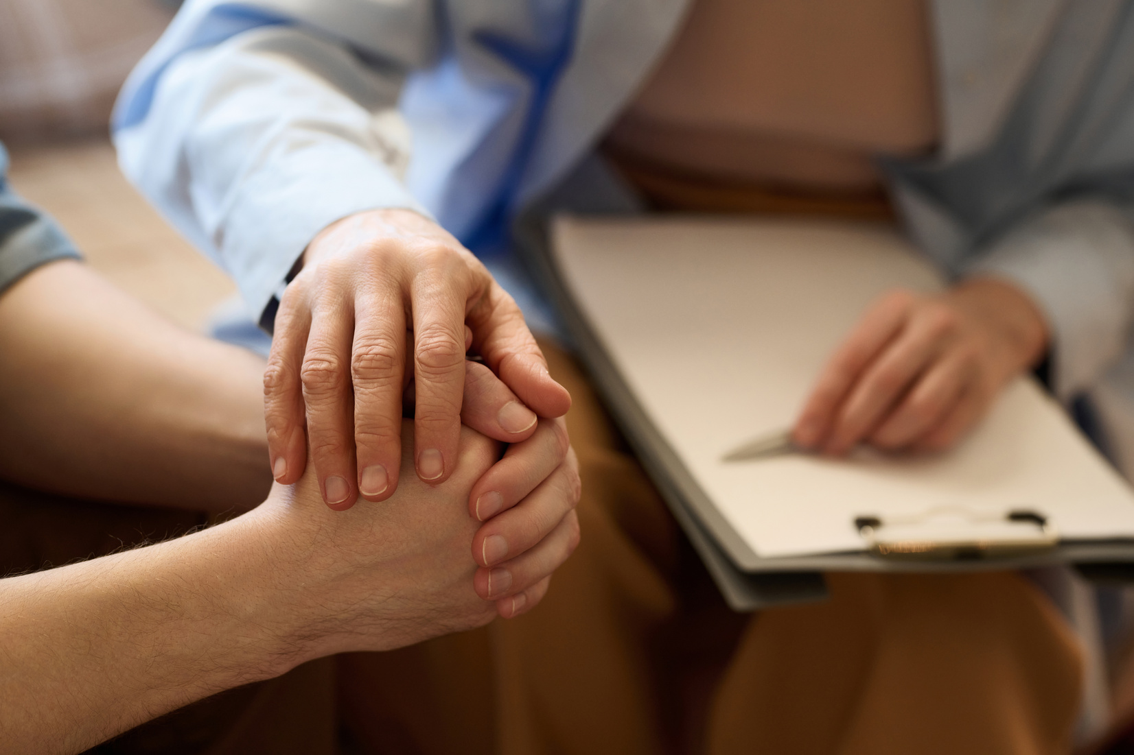 Therapist supporting her patient at session